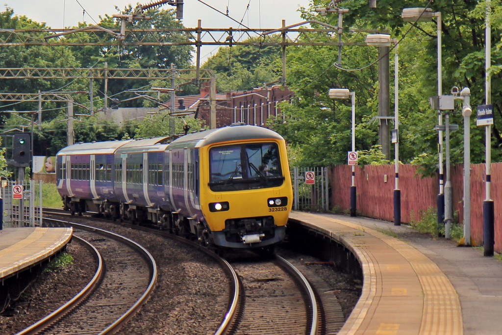 A Class 323 at Cheedle Hulme Station