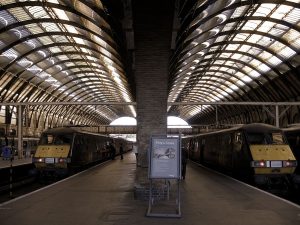 2 driving van trailers stand at kings cross station the start of the East Coast Main Line