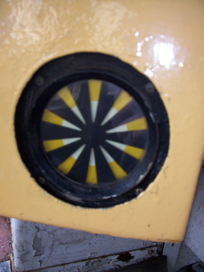 A sunflower looking device located in the cab of a train