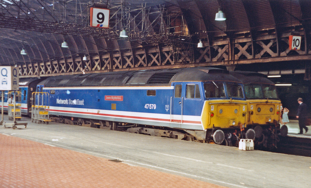 2 class 47 stand at Paddington station 1991