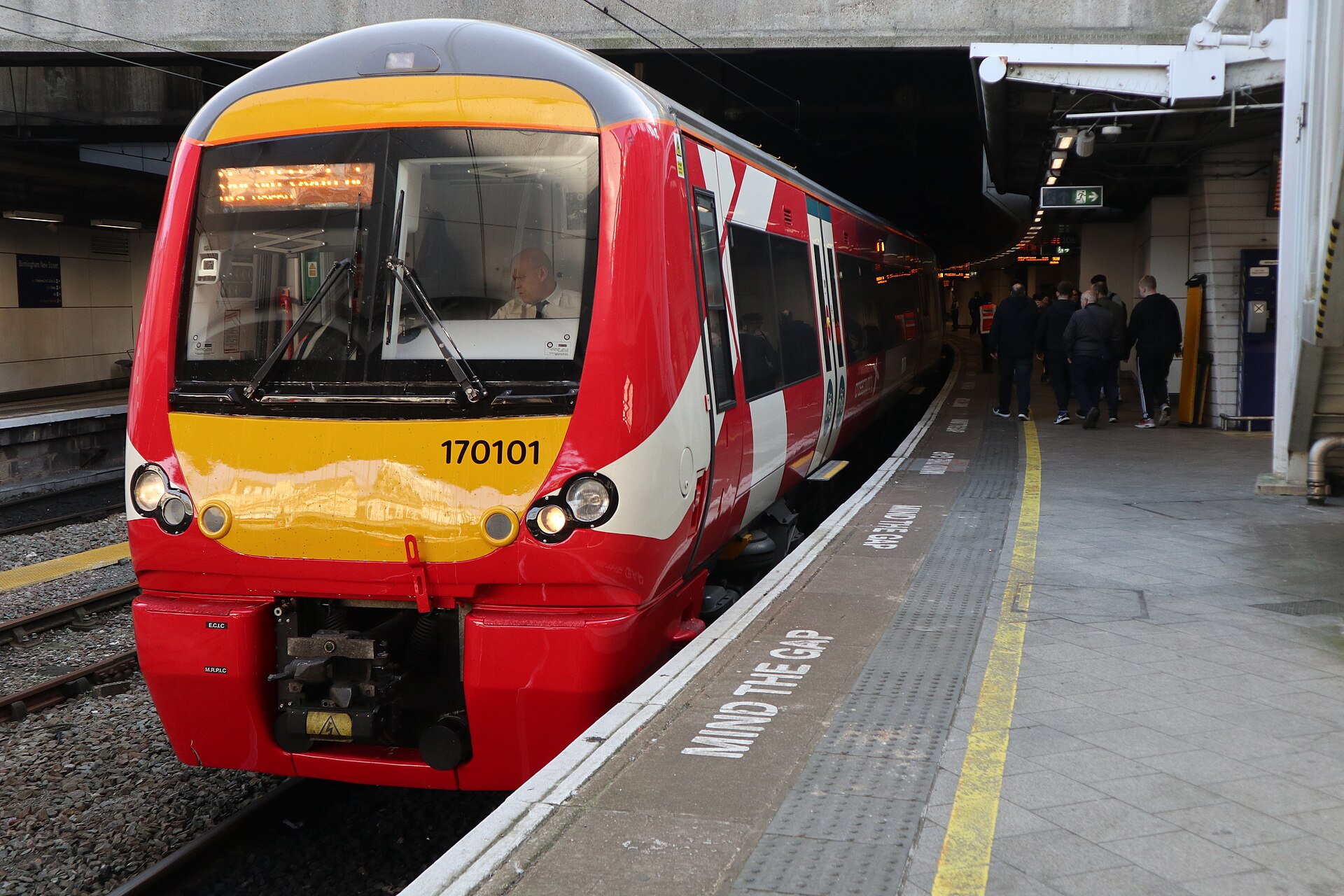 A refurbished class 170 in the new striking red cross country livery